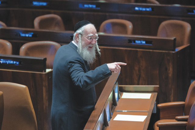  UTJ MK Yisrael Eichler points at a fellow lawmaker in the Knesset plenum. (credit: YONATAN SINDEL/FLASH90)