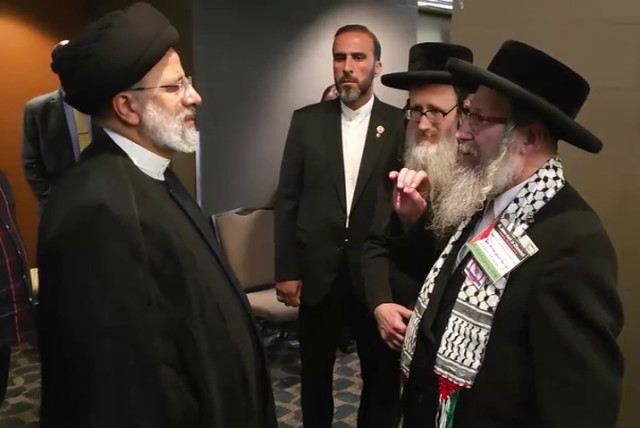  Iranian President Ebrahim Raisi (left) meets with members of the anti-Zionist Neturei Karta group on the sidelines of the UN General Assembly. September 20, 2023 (credit: SCREENSHOT FARS NEWS AGENCY)