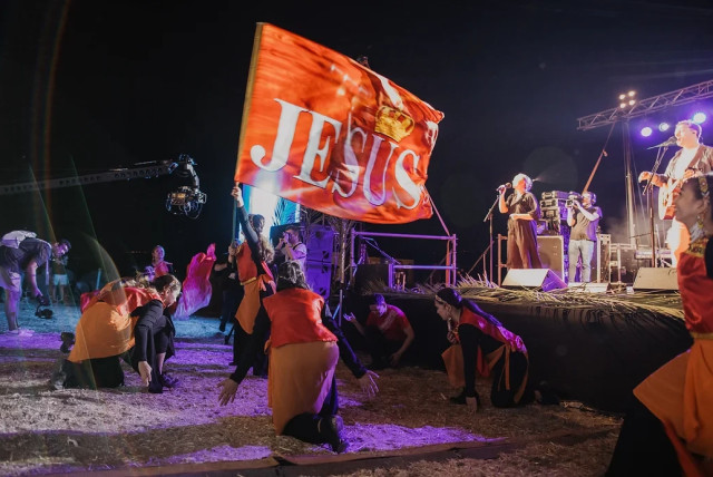  King Jesus Banner, dance banner unveiled on opening night of Feast of the Tabernacles by the International Christian Embassy Jerusalem, 2022. (photo credit: COURTESY ICEJ)