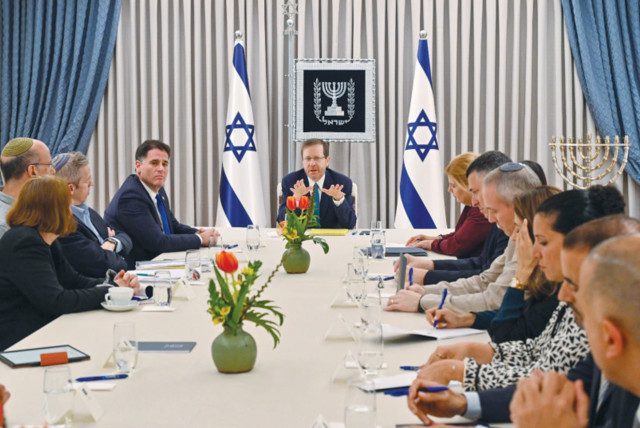  PRESIDENT ISAAC Herzog meets with members of the government coalition and political opposition to discuss judicial reform, at the President’s Residence in Jerusalem, in March. Pray that all parties seek compromise, the writer urges.  (photo credit: KOBI GIDEON/GPO)