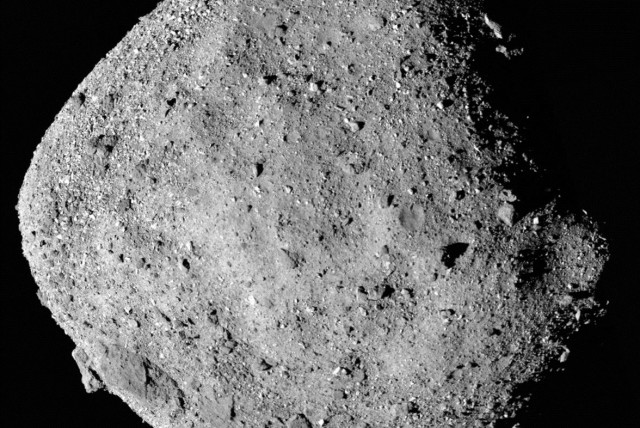 This mosaic image of asteroid Bennu, composed of 12 PolyCam images collected on December 2, 2018 by the OSIRIS-REx spacecraft from a range of 15 miles (24 km). (credit: NASA/Goddard/University of Arizona/Handout via REUTERS)