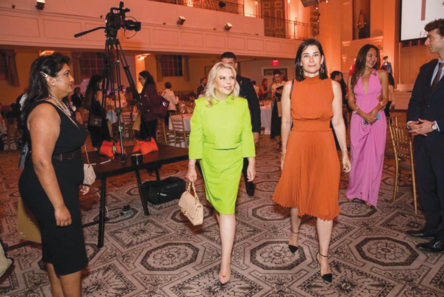  Sara Netanyahu, in the company of wives of heads of state and government, arrives at Fashion 4 Development.  (photo credit: Ohad Kav)