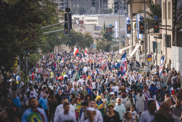  THOUSANDS OF Christian pilgrims and Israelis take part in the Feast of Tabernacles march in Jerusalem, last year. Many Israelis have come to trust Evangelical support, according to the writer. (photo credit: YONATAN SINDEL/FLASH90)