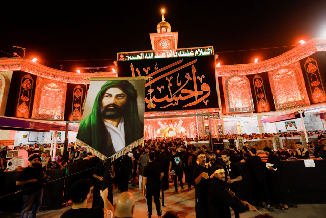  Shi'ite Muslim pilgrims take part in a mourning ceremony, during the holy Shi'ite ritual of Arbaeen, in the holy city of Karbala, Iraq September 5, 2023 (photo credit: REUTERS/ALAA AL-MARJANI)