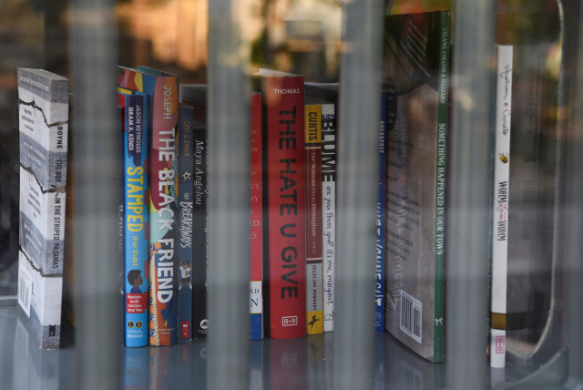  A Little Free Library, which was designed to look like a prison, invites residents to take books that the library says have been challenged by schools across the state of Texas, in Houston, Texas, U.S. May 3, 2023. (credit: REUTERS/CALLAGHAN O’HARE)
