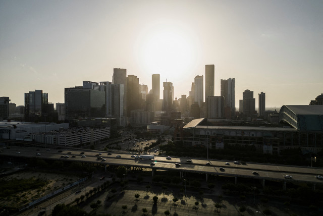 The skyline of downtown Houston is seen in Houston, Texas, US. July 16, 2023 (credit: GO NAKAMURA/REUTERS)