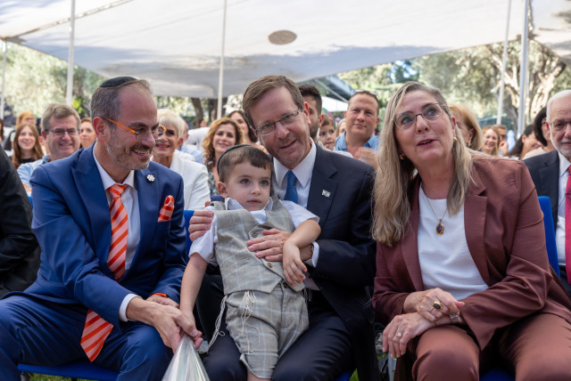  Eli Beer, President Herzog, Michal Herzog, and the boy that was saved. (credit: KOBI GIDEON/GPO)
