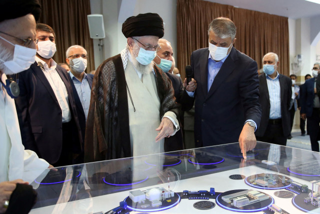  Iran's Supreme Leader Ayatollah Ali Khamenei views a model of a nuclear facility, in Tehran, Iran June 11, 2023 (credit: Office of the Iranian Supreme Leader/WANA (West Asia News Agency) via REUTERS)
