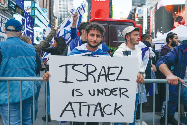  A PRO-ISRAEL rally takes place at Times Square in New York City, May 2021, during Operation Guardian of the Walls. The writer poses the question: Are Jewish Americans supportive of Israel? (credit: David ‘Dee’ Delgado/Reuters)