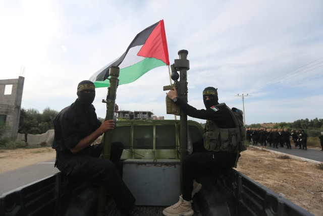  Members of the Al-Quds Brigades, the military wing of the Islamic Jihad movement in Palestine, organize a large military parade and display of new missiles, on the 36th anniversary of the launch, in Gaza City, on October 4, 2023 (credit: ATIA MOHAMMED/FLASH90)