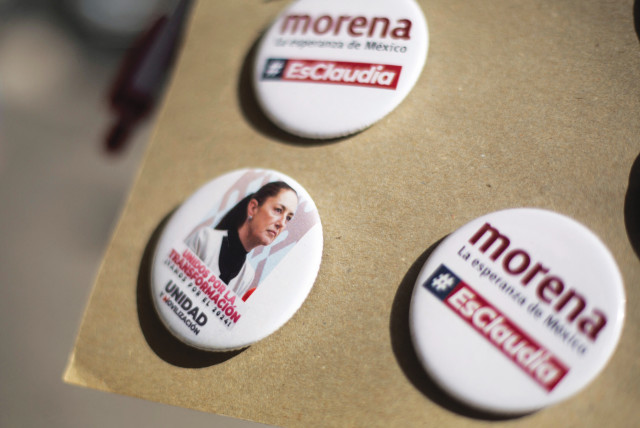  MERCHANDISE FEATURING Sheinbaum is sold on the day she is certified as presidential candidate for the ruling National Regeneration Movement (MORENA) party, in Mexico City, Sept. 10 (credit: Quetzalli Nicte-Ha/REUTERS)
