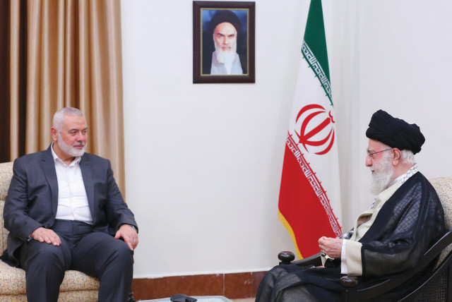  Iran's Supreme Leader Ayatollah Ali Khamenei meets with Hamas leader Ismail Haniyeh in Tehran, Iran, in June. (credit: Office of the Iranian Supreme Leader/West Asia News Agency/Reuters)