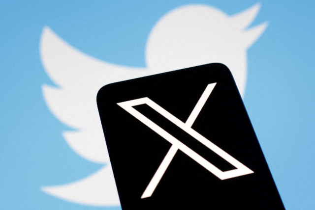  The logo for social media platform X, following the rebranding of Twitter, is seen covering the old logo in this illustration taken, July 24, 2023. (credit: REUTERS/DADO RUVIC)
