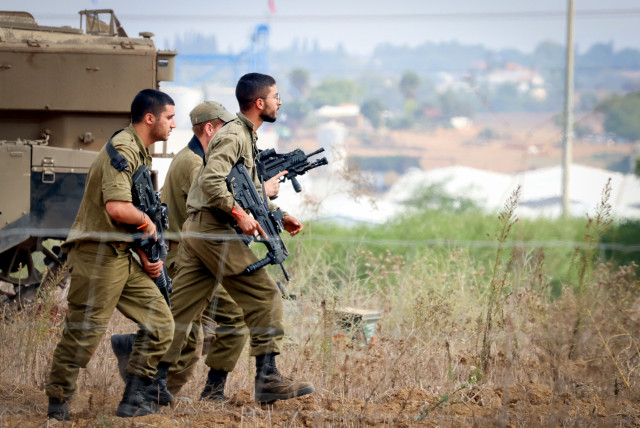  Israeli soldiers at a staging area near the Israeli-Gaza Border, southern Israel, October 10, 2023.  (credit: YOSSI ZAMIR/FLASH90)