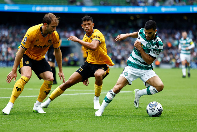  Celtic's Liel Abada in action with Wolverhampton Wanderers' Matheus Nunes (credit: REUTERS/CLODAGH KILCOYNE)