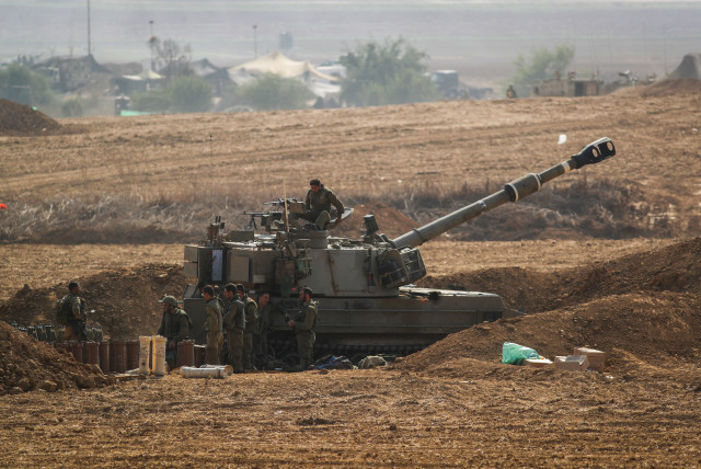  AN ISRAELI artillery unit is stationed near the Israel-Gaza border this week. (credit: OREN BEN HAKOON/FLASH90)