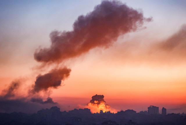  Smoke rises after an Israeli airstrike in Gaza City, on October 13, 2023 (credit: ATIA MOHAMMED/FLASH90)