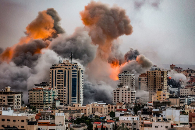  A ball of fire and smoke rises during an Israeli airstrikes in the Gaza Strip, on October 9, 2023. (credit: ATIA MOHAMMED/FLASH90)