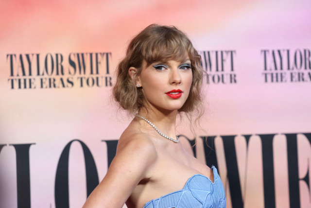  Taylor Swift attends a premiere for Taylor Swift: The Eras Tour in Los Angeles, California, U.S., October 11, 2023. (credit: REUTERS/MARIO ANZUONI)
