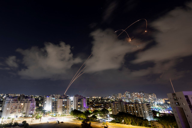  Israel's Iron Dome anti-missile system intercepts rockets launched from the Gaza Strip, as seen from Ashkelon, in southern Israel, October 19, 2023 (credit: AMIR COHEN/REUTERS)