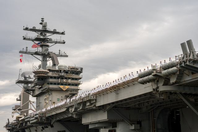  The U.S. Navy Nimitz-class aircraft carrier USS Dwight D. Eisenhower deploys from Naval Station Norfolk, Virginia, U.S. October 14, 2023. (credit: US Navy/Mass Communication Specialist 2nd Class Anderson W. Branch/Handout)