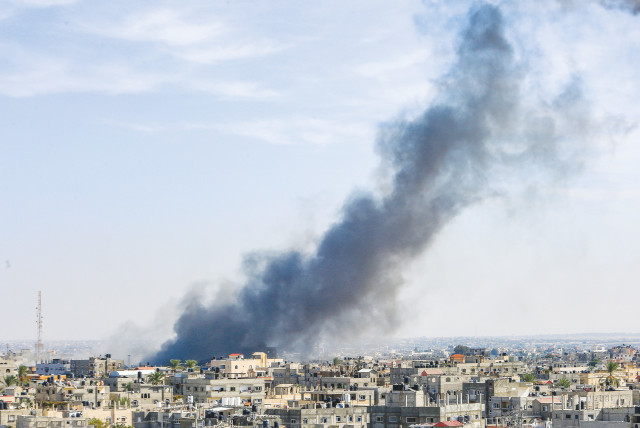  SMOKE RISES amid Israeli air strikes in Rafah, in the southern Gaza Strip. (credit: ABED RAHIM KHATIB/FLASH90)
