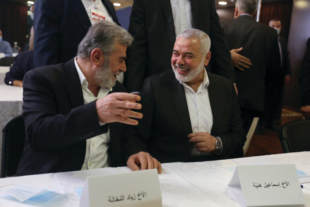  HAMAS LEADER Ismail Haniyeh (right) and Palestinian Islamic Jihad chief Ziyad al-Nakhalah attend a meeting of Palestinian factions, in Beirut, in 2020. (credit: AZIZ TAHER/REUTERS)
