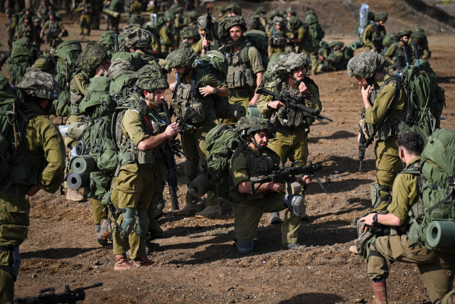  IDF reserve Infantry and Merkava Tank soldiers train in a military exercise in the Golan Heights on October 23, 2023.  (credit: MICHAEL GILADI/FLASH90)