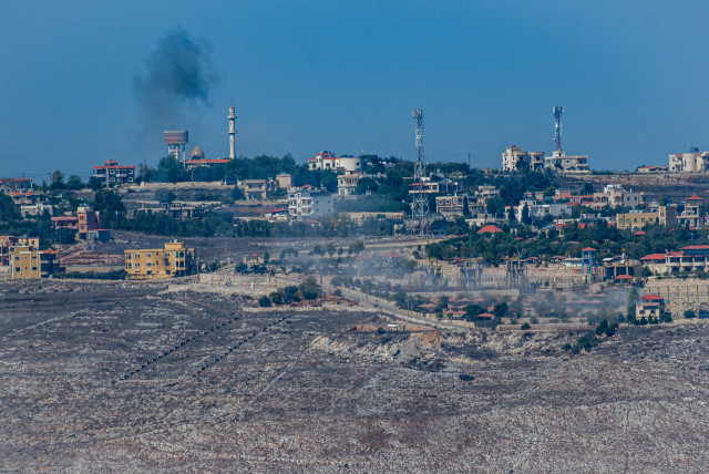  Smoke rises during an exchange of fire between the IDF and terrorists from the Hezbollah organization on the border between Israel and Lebanon, October 25, 2023 (credit: AYAL MARGOLIN/FLASH90)