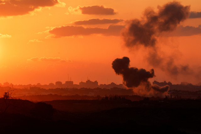  A view shows smoke in the Gaza Strip as seen from Israel's border with the Gaza Strip, in southern Israel October 18, 2023 (credit: REUTERS/AMIR COHEN)