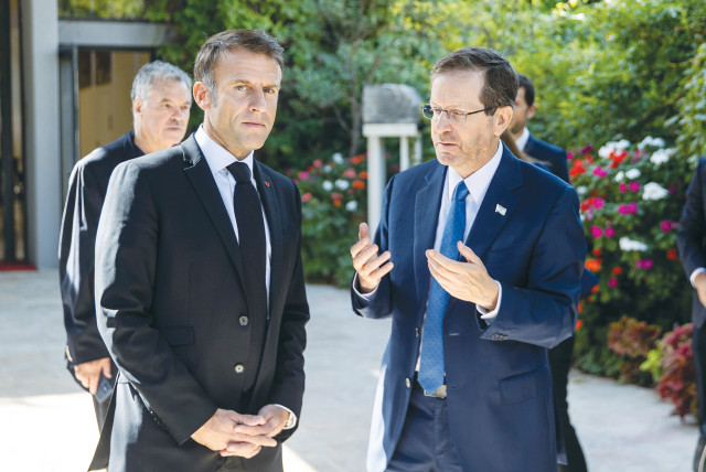  PRESIDENT ISAAC HERZOG makes a point to French President Emmanuel Macron at the President’s Residence in Jerusalem, October 2023 (credit: OREN BEN HAKOON/FLASH90)