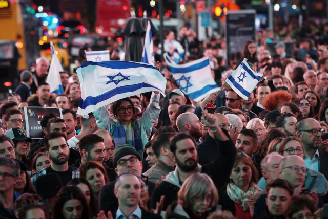  People gather for a demonstration at Times Square to express solidarity with Israel, amid the ongoing conflict between Israel and the Palestinian Islamist group Hamas, in New York City, U.S., October 19, 2023 (credit: REUTERS/MIKE SEGAR)