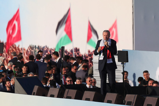  Turkish President Tayyip Erdogan speaks during a rally in solidarity with Palestinians in Gaza, amid the ongoing conflict between Israel and the Palestinian Islamist group Hamas, in Istanbul, Turkey October 28, 2023. (credit: REUTERS/DILARA SENKAYA)