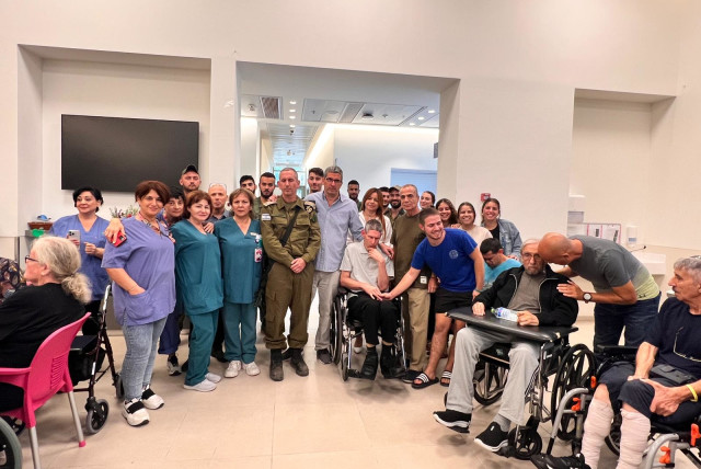  IDF spokesman Brigadier-General Daniel Hagari went to Adi Negev-Nahalat Eran in the Eshkol region to visit his very-disabled brother, Yoni, who was one of the first residents of the village. (credit: Adi Negev-Nahalat Eran)