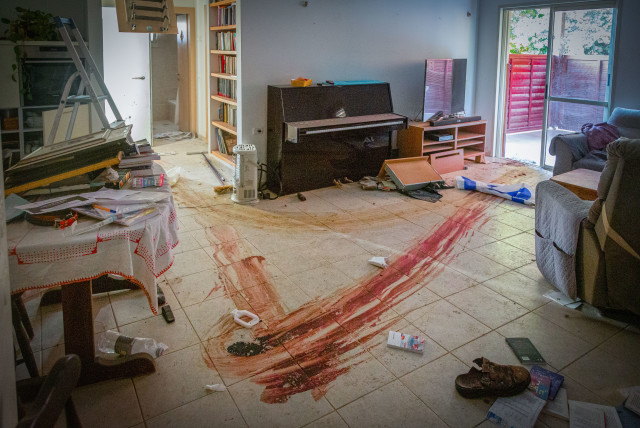  Blood in houses when Hamas terrorists infiltrated Kibbutz Be'eri, and 30 other nearby communities in Southern Israel on October 7, killing more than 1400 people, and taking more than 200 hostages into Gaza, near the Israeli-Gaza border.  (credit: EDI ISRAEL/FLASH90)