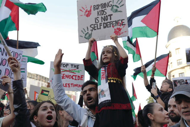  PROTESTERS CHANT ‘Free Palestine,’ in a pro-Palestine march. (credit: Andrea Campeanu/Reuters)