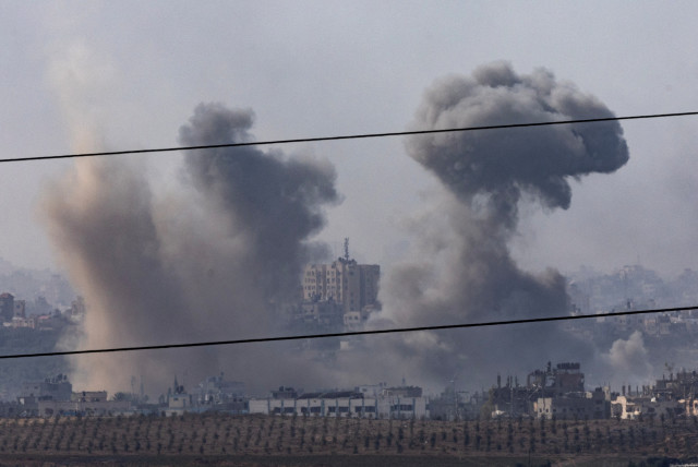  Smoke rises following an Israeli strike inside the Gaza Strip, as seen from Israel, October 31, 2023.  (credit: REUTERS/EVELYN HOCKSTEIN)