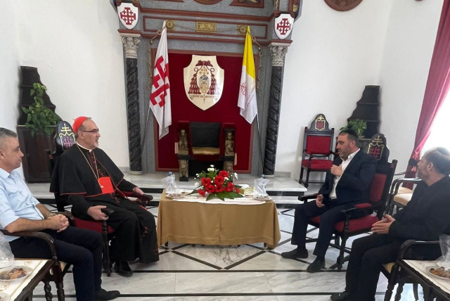  Interior Minister Moshe Arbel is seen meeting with Jerusalem's Latin patriarch Cardinal Pierbattista Pizzaballa. (credit: COURTESY INTERIOR MINISTRY)