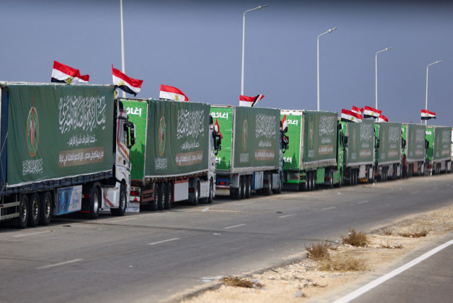  Trucks carrying humanitarian aid for Palestinians, are seen on the day of Egyptian Prime Minister Mostafa Madbouly's visit to the Rafah border crossing between Egypt and the Gaza Strip, amid the ongoing conflict between Israel and Palestinian Islamist group Hamas, in Rafah, Egypt, October 31, 2023. (credit: REUTERS/Mohamed Abd El Ghany/File Photo)