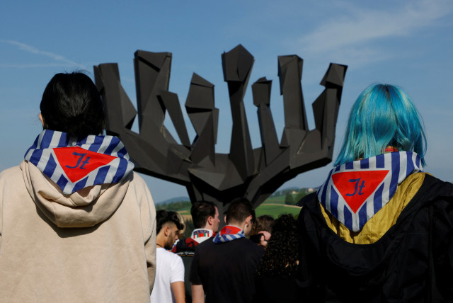  People participate in a commemoration of the liberation of the former concentration camp KZ Mauthausen, at the memorial site in Mauthausen, Austria, May 7, 2023 (credit: REUTERS/LEONHARD FOEGER)