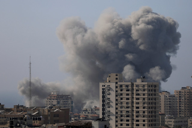  Smoke rises after Israeli strikes, amid the ongoing conflict between Israel and Palestinian Islamist group Hamas, in Gaza City November 6, 2023. (credit: REUTERS/MOHAMMED AL-MASRI)