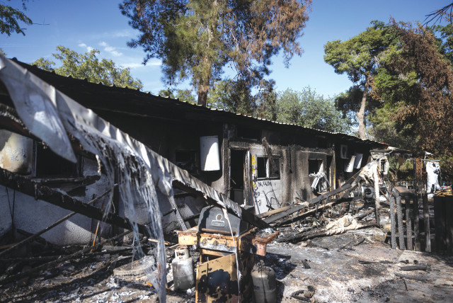 The destruction caused by Hamas terrorists in Kibbutz Nir Oz on October 7. Yonadav Levenstein fought there fearlessly, saving many from unspeakable fates, says the writer. (credit: Chaim Goldberg/Flash90)