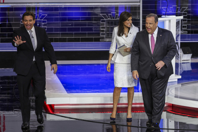  Nikki Haley, Ron DeSantis, and Chris Christie at the third Republican candidates' U.S. presidential debate of the 2024 U.S. presidential campaign hosted by NBC News at the Adrienne Arsht Center for the Performing Arts in Miami, Florida, U.S., November 8, 2023. (credit: REUTERS/MIKE SEGAR)