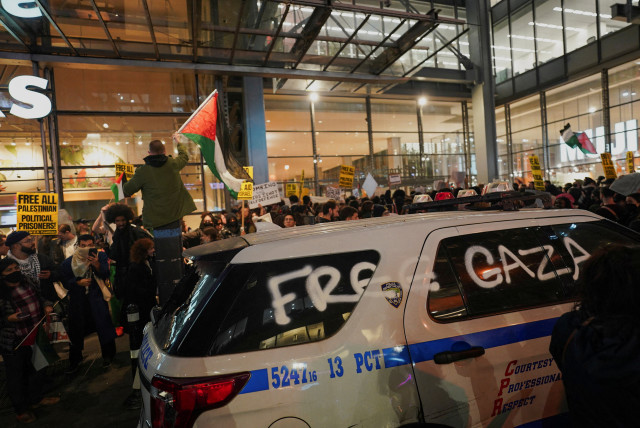 People take part in a rally in support of Palestinians in Gaza, during the ongoing conflict between Israel and Hamas, outside the New York Times building, in New York City, US, November 9, 2023. (credit: REUTERS/David Dee Delgado)