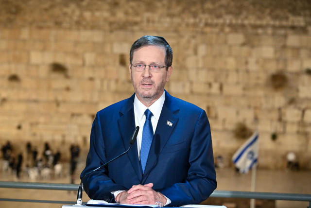  President Isaac Herzog addresses the Washington DC Israel rally from the Western Wall in Jerusalem. November 14, 2023. (credit: KOBI GIDON / GPO)