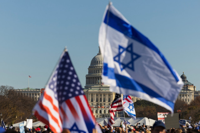  Israel and American flags are flown near the U.S. Capitol during a rally in support of Israel and protest against antisemitism on the National Mall in Washington, November 14, 2023. (credit: TOM BRENNER/REUTERS)
