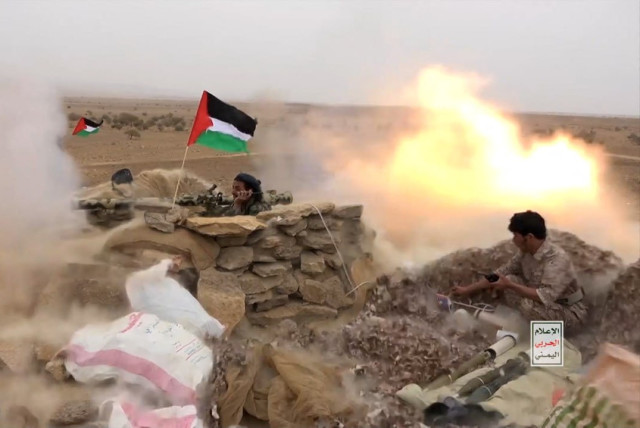  Houthi fighters fire anti-tank grenades during a military manoeuvre near Sanaa, Yemen, October 30, 2023. (credit: Houthi Media Center/Handout via REUTERS)