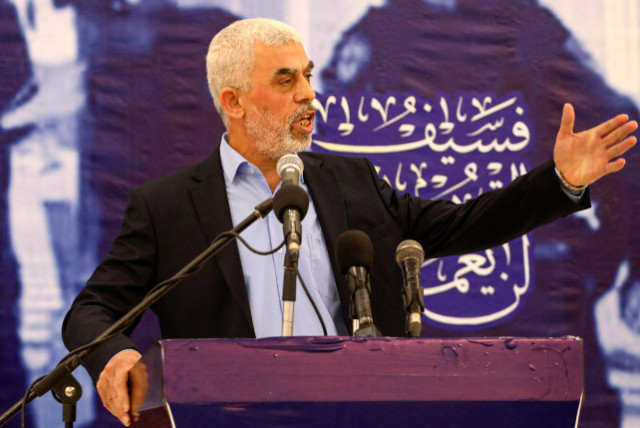 Yahya Sinwar leader of the Palestinian Hamas Islamist movement speaks during a meeting with members of the the Ezzedine al-Qassam Brigades, the armed wing of the Palestinian Hamas movement, in Gaza City, on April 30, 2022 (credit: ATTIA MUHAMMED/FLASH90)