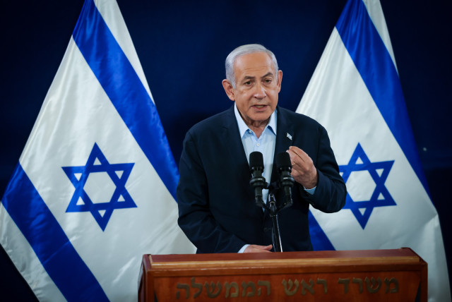  Prime Minister Benjamin Netanyahu speaks to the media on November 22, 2023 (credit: Chaim Goldberg/Flash90)