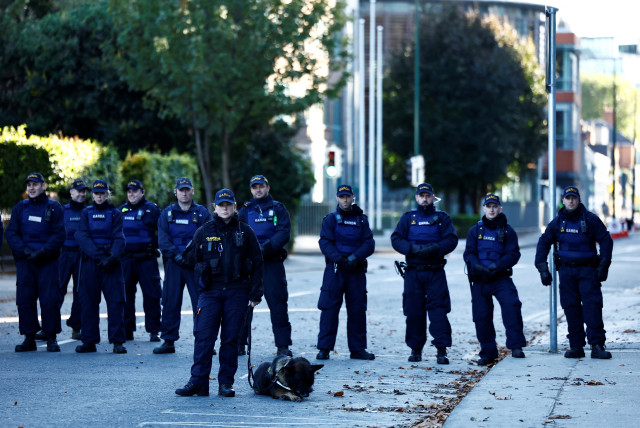 Gardai (Police) block the road beside the Israeli embassy as demonstrators rally during a ''Stand with Palestine'' march in solidarity with Gaza, in Dublin, Ireland, October 14, 2023. (credit: CLODAGH KILCOYNE/REUTERS)